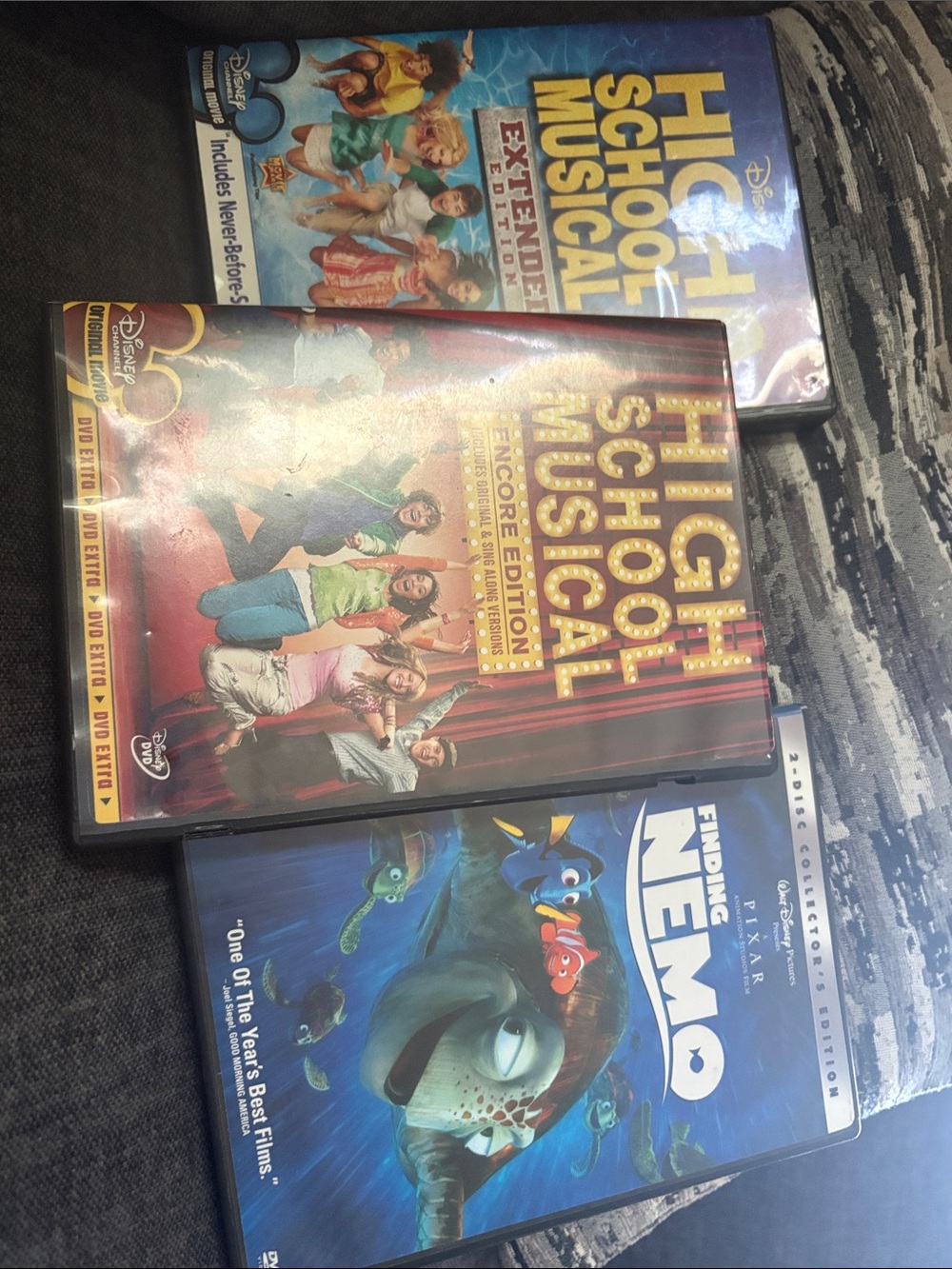 High school musical and finding Nemo DVDs